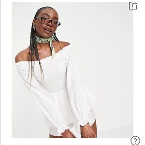 Brand new, never worn white romper.